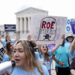 
              Demonstrators protest about abortion outside the Supreme Court in Washington, Friday, June 24, 2022. (AP Photo/Jacquelyn Martin)
            