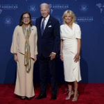 
              President Joe Biden, center, and first lady Jill Biden, greet Alexandra Hill, Minister of Foreign Affairs of the Republic of El Salvador, during the Summit of the Americas, Wednesday, June 8, 2022, in Los Angeles. (AP Photo/Evan Vucci)
            