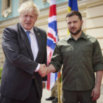 
              In this image provided by the Ukrainian Presidential Press Office, Ukrainian President Volodymyr Zelenskyy, right, and Britain's Prime Minister Boris Johnson, pose for a photo during their meeting in downtown Kyiv, Ukraine, Friday, June 17, 2022. (Ukrainian Presidential Press Office via AP)
            