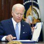 
              President Joe Biden signs into law S. 2938, the Bipartisan Safer Communities Act gun safety bill, in the Roosevelt Room of the White House in Washington, Saturday, June 25, 2022. (AP Photo/Pablo Martinez Monsivais)
            
