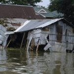 
              A damaged house is seen as flood water levels recede slowly in Sylhet, Bangladesh, Wednesday, June 22, 2022. (AP Photo/Mahmud Hossain Opu)
            