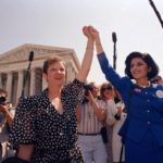 
              FILE - Norma McCorvey, Jane Roe in the 1973 court case, left, and her attorney Gloria Allred hold hands as they leave the Supreme Court building in Washington, April 26, 1989, after sitting in while the court listened to arguments in a Missouri abortion case. The Supreme Court has ended constitutional protections for abortion that had been in place nearly 50 years — a decision by its conservative majority to overturn the court's landmark abortion cases. (AP Photo/J. Scott Applewhite)
            