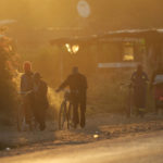 
              People head home at sunset in Harare, Zimbabwe, Monday, June, 6, 2022. Rampant inflation is making it increasingly difficult for people in Zimbabwe to make ends meet. Since the start of Russia’s war in Ukraine, official statistics show that Zimbabwe’s inflation rate has shot up from 66% to more than 130%. The country's finance minister says the impact of the Ukraine war is heaping problems on the already fragile economy. (AP Photo/Tsvangirayi Mukwazhi)
            