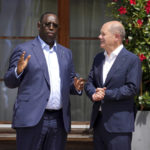 
              German Chancellor Olaf Scholz, right, greets Sengal's President Macky Sall during the official welcome ceremony of G7 leaders and Outreach guests at Castle Elmau in Kruen, near Garmisch-Partenkirchen, Germany, on Monday, June 27, 2022. The Group of Seven leading economic powers are meeting in Germany for their annual gathering Sunday through Tuesday. (AP Photo/Matthias Schrader)
            