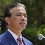 
              FILE - California Attorney General Rob Bonta speaks at a news conference in Sacramento, Calif., Aug. 17, 2021. Low voter turnout and some political gamesmanship may decide which of three main challengers emerges from California's primary, on Tuesday, June 7, 2022, to take on Bonta in the November election. (AP Photo/Rich Pedroncelli, File)
            