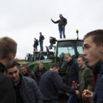 
              FILE - Protesting farmers gather in The Hague, Netherlands, Oct. 16, 2019. The Dutch government unveiled goals Friday to drastically reduce emissions of nitrogen oxides to protect the environment, a plan that would lead to major upheavals in the Netherlands' multibillion dollar agriculture industry and has already angered some farmers. (AP Photo/Peter Dejong, File)
            