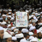 
              Muslims for a protest against Nupur Sharma, a spokesperson of India's governing Hindu nationalist Bharatiya Janata Party, as they react to the derogatory references to Islam and the Prophet Muhammad made by her, during a protest outside a mosque in Dhaka, Bangladesh, Thursday, June 16, 2022. Thousands of people marched in Bangladesh’s capital on Thursday to demand the governments of Bangladesh and India officially condemn the comments by two Indian governing party officials deemed derogatory to Islam’s Prophet Muhammad. (AP Photo/Mahmud Hossain Opu)
            
