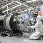 
              In this photo released by Rocket Lab, a technician works on a component of Rocket Lab's Electron rocket ahead of the launch on the Mahia peninsula in New Zealand on March 10, 2022. NASA plans to send up a satellite to track a new orbit around the moon which it hopes to use in the coming years to once again land astronauts on the lunar surface. (Rocket Lab via AP)
            