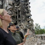 
              U.S. ambassador to Ukraine Bridget Brink, left, listens to Ukraine's Prosecutor General Iryna Venediktov during a tour of a destroyed area in Borodyanka, outskirts of Kyiv, Ukraine, Saturday, June 4, 2022. (AP Photo/Natacha Pisarenko)
            