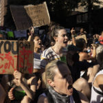 
              Abortion-rights activists sit on the street during a protest following Supreme Court's decision to overturn Roe v. Wade, Friday, June 24, 2022, in New York. (AP Photo/Yuki Iwamura)
            