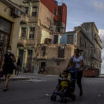 
              The roofless, top story of a home is exposed in Havana, Cuba, Wednesday, June 22, 2022. One of Cuba’s main social problems is a shortage of quality housing caused by decades of inadequate maintenance, a lack of new housing and impediments facing people trying to fix up their own homes. (AP Photo/Ramon Espinosa)
            