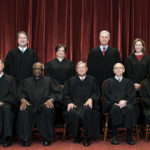 
              FILE - Members of the Supreme Court pose for a group photo at the Supreme Court in Washington, April 23, 2021. Seated from left are Associate Justice Samuel Alito, Associate Justice Clarence Thomas, Chief Justice John Roberts, Associate Justice Stephen Breyer and Associate Justice Sonia Sotomayor, Standing from left are Associate Justice Brett Kavanaugh, Associate Justice Elena Kagan, Associate Justice Neil Gorsuch and Associate Justice Amy Coney Barrett. The Supreme Court has ended constitutional protections for abortion that had been in place nearly 50 years — a decision by its conservative majority to overturn the court's landmark abortion cases. (Erin Schaff/The New York Times via AP, Pool, File)
            