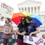 
              Abortion-rights activists react outside the Supreme Court in Washington, Friday, June 24, 2022. The Supreme Court has ended constitutional protections for abortion that had been in place nearly 50 years in a decision by its conservative majority to overturn Roe v. Wade. (AP Photo/Jacquelyn Martin)
            