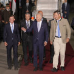 
              President Joe Biden, center, is accompanied by Bavarian Prime Minister Markus Soeder, second right, after arriving at Franz-Josef-Strauss Airport near Munich, Germany Saturday, June 25, 2022, ahead of the G7 summit. The G7 Summit will take place at Castle Elmau near Garmisch-Partenkirchen from June 26 through June 28, 2022. (AP Photo/Markus Schreiber)
            