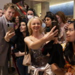 
              Actor Austin Butler greets fans as he arrives for a screening of the film, "Elvis," in Toronto, Friday, June 17, 2022. (Chris Young/The Canadian Press via AP)
            