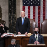 
              FILE - Vice President Mike Pence, left, and Speaker of the House Nancy Pelosi, D-Calif., return to the House chamber after midnight, Jan. 7, 2021, to finish the work of the Electoral College after a mob loyal to President Donald Trump stormed the Capitol in Washington and disrupted the process.  (AP Photo/J. Scott Applewhite, File)
            