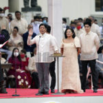 
              President-elect Ferdinand "Bongbong" Marcos Jr., right, is sworn in by Supreme Court Chief Justice Alexander Gesmundo during the inauguration ceremony at National Museum on Thursday, June 30, 2022 in Manila, Philippines. Marcos was sworn in as the country's 17th president. (AP Photo/Aaron Favila)
            