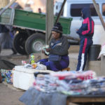 
              A vendor counts her money after making a sale in Harare, Thursday ,June, 2, 2022. Rampant inflation is making it increasingly difficult for people in Zimbabwe to make ends meet. Since the start of Russia’s war in Ukraine, official statistics show that Zimbabwe’s inflation rate has shot up from 66% to more than 130%. The country's finance minister says the impact of the Ukraine war is heaping problems on the already fragile economy. (AP Photo/Tsvangirayi Mukwazhi)
            