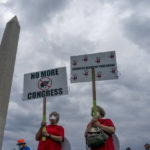 
              People participate in the second March for Our Lives rally in support of gun control in front of the Washington Monument, Saturday, June 11, 2022, in Washington. The rally is a successor to the 2018 march organized by student protestors after the mass shooting at a high school in Parkland, Fla. (AP Photo/Gemunu Amarasinghe)
            