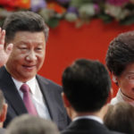 
              FILE - Chinese President Xi Jinping, left, and Hong Kong's new Chief Executive Carrie Lam attend the ceremony of administering the oath for a five-year term in office at the Hong Kong Convention and Exhibition Center in Hong Kong on July 1, 2017. Xi will visit Hong Kong this week to celebrate the 25th anniversary of the former British colony's 1997 return to China, a state news agency said Saturday, June 25, 2022, in his first trip outside the mainland since the start of the coronavirus pandemic 2 1/2 years ago. (AP Photo/Kin Cheung, File)
            
