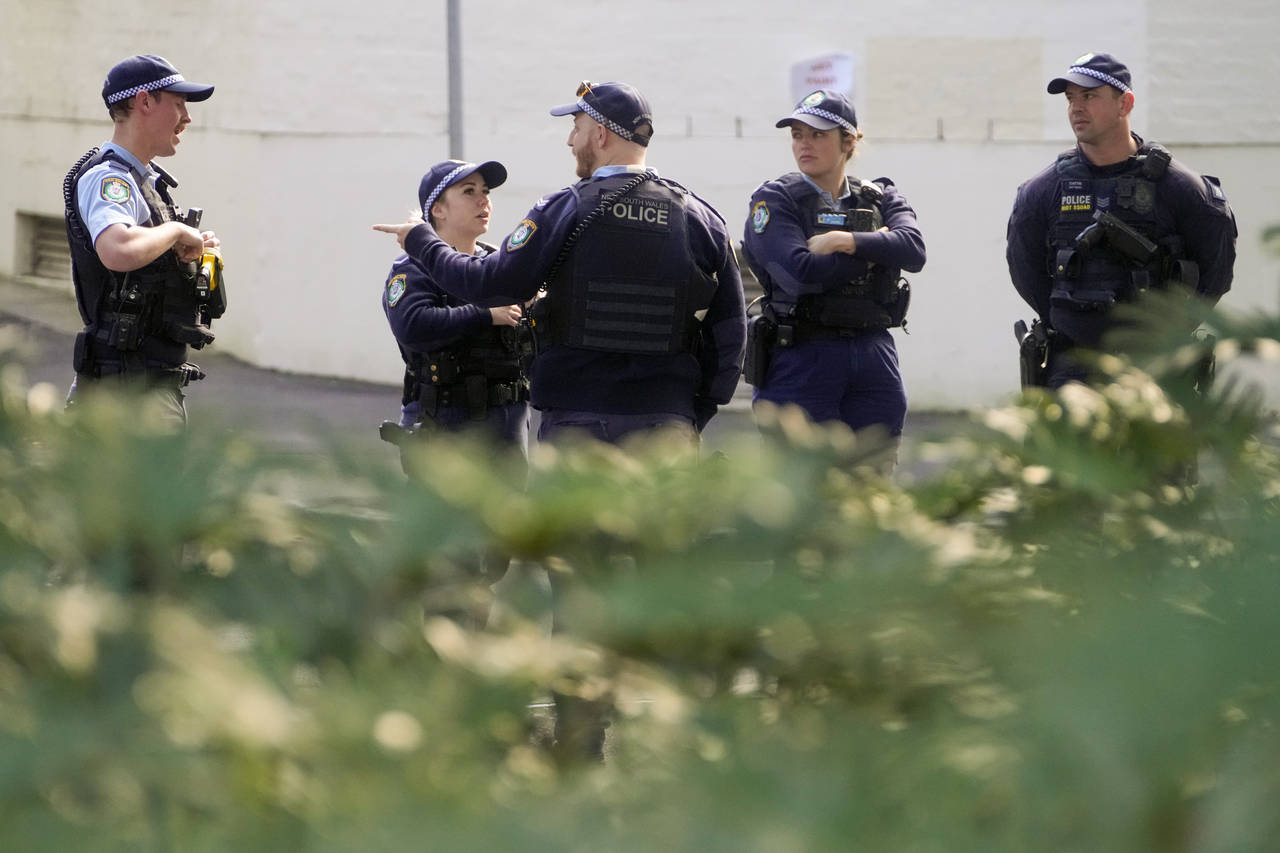 Police patrol a park where Blockade Australia protest organizer Sally-Anne Brown held a press confe...