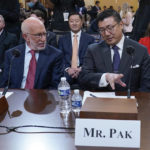 
              Benjamin Ginsberg, Washington attorney and elections lawyer, left, and BJay Pak, former U.S. Attorney in Atlanta, talk before they are sworn in to testify as the House select committee investigating the Jan. 6 attack on the U.S. Capitol continues to reveal its findings of a year-long investigation, at the Capitol in Washington, Monday, June 13, 2022. (AP Photo/Susan Walsh)
            