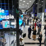 
              Participants and journalists gather in a hall at the St. Petersburg International Economic Forum in St.Petersburg, Russia, Friday, June 17, 2022. Russia came under a wide array of sanctions after sending troops into Ukraine in February. Hundreds of foreign companies also suspended operations in Russia or pulled out of the country entirely. (AP Photo/Dmitri Lovetsky)
            