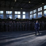 
              French President Emmanuel Macron arrives to speak with French soldiers at the Mihail Kogalniceanu Air Base, near the city of Constanta, Romania, Tuesday, June 14, 2022. French President Emmanuel Macron is set to hold bilateral talks with officials and meet with French troops who are part of NATO's response to Russia's invasion of Ukraine. France has around 500 soldiers deployed in Romania and has been a key player in NATO's bolstering of forces on the alliance's eastern flank following Russia's invasion on Feb. 24. (Yoan Valat, Pool via AP)
            
