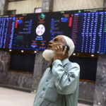 
              An investor monitors Index on the big screen at at the Pakistan Stock Exchange (PSE), in Karachi, Pakistan, Friday, June 24, 2022. Pakistan's stock market suddenly fell by three percent on Friday, shortly after the government of recently elected Prime Minister Shahbaz Sharif suddenly announced the imposition of additional taxes on the corporate and banking sector in an effort aimed at stabilizing the country's fledgling economy. (AP Photo/Fareed Khan)
            