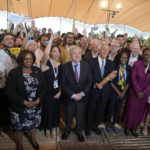 
              United Nations Secretary-General Antonio Guterres, center, Portuguese President Marcelo Rebelo de Sousa, center right, and actor Jason Momoa, behind Guterrs, pose with participants at the United Nations' Youth and Innovation Forum at Carcavelos beach, outside Lisbon, Sunday, June 26, 2022. From June 27 to July 1, the United Nations is holding its Oceans Conference in Lisbon expecting to bring fresh momentum for efforts to find an international agreement on protecting the world's oceans. (AP Photo/Armando Franca)
            