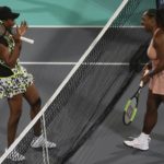 
              FILE - Venus Williams, left, from the U.S., celebrates after defeating her sister, Serena, in a match during the opening day of the Mubadala World Tennis Championship in Abu Dhabi, United Arab Emirates, Thursday, Dec. 27, 2018. (AP Photo/Kamran Jebreili, File)
            