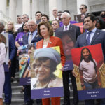 
              From left, Rep. Veronica Escobar, D-Texas, House Speaker Nancy Pelosi of Calif., and Rep. Jimmy Gomez, D-Calif., listen as they attend an event on the steps of the U.S. Capitol about gun violence Friday, June 24, 2022. (AP Photo/J. Scott Applewhite)
            