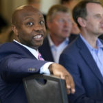 
              Sen. Tim Scott, R-S.C., waits to speak at an Iowa GOP reception, Thursday, June 9, 2022, in Cedar Rapids, Iowa. At least a half dozen GOP presidential prospects are planning Iowa visits this summer, forays that are advertised as promoting candidates and the state Republican organization ahead of the fall midterm elections. But in reality, the trips are about building relationships and learning the political geography in the state scheduled to launch the campaign for the party's 2024 nomination. (AP Photo/Charlie Neibergall)
            