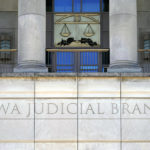 
              The facade of the Iowa Judicial Branch Building is shown, Friday, June 17, 2022, in Des Moines, Iowa. The Iowa Supreme Court on Friday cleared the way for lawmakers to severely limit or even ban abortion in the state, reversing a decision by the court just four years ago that guaranteed the right to the procedure under the Iowa Constitution.  (AP Photo/Charlie Neibergall)
            