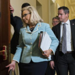 
              Rep. Liz Cheney, R-Wyo., followed by Rep. Adam Kinzinger, R-Ill., walk to the hearing room on Capitol Hill in Washington, Monday, June 13, 2022, for the public hearing of the House select committee investigating the Jan. 6 attack on the U.S. Capitol. (AP Photo/Manuel Balce Ceneta)
            