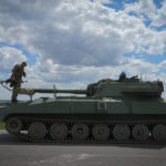 
              A Ukrainian soldier stands on a self-propelled artillery vehicle Gvozdika, in the Donetsk region, Ukraine, Friday, June 17, 2022. (AP Photo/Efrem Lukatsky)
            