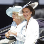
              Camilla, Duchess of Cornwall, left, and Kate, Duchess of Cambridge ride in a carriage during the Trooping the Color, in London, Thursday June 2, 2022, on the first of four days of celebrations to mark the Platinum Jubilee. The events over a long holiday weekend in the U.K. are meant to celebrate the monarch’s 70 years of service. (Chris Jackson/Pool via AP)
            