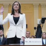 
              Cassidy Hutchinson, former aide to Trump White House chief of staff Mark Meadows, is sworn in to testify as the House select committee investigating the Jan. 6 attack on the U.S. Capitol continues to reveal its findings of a year-long investigation, at the Capitol in Washington, Tuesday, June 28, 2022. (AP Photo/Jacquelyn Martin)
            