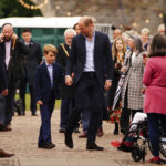 
              Britain's Prince William and Prince George during their visit to Cardiff Castle to meet performers and crew involved in the special Platinum Jubilee Celebration Concert taking place in the castle grounds later in the afternoon, Saturday June 4, 2022, on the third of four days of celebrations to mark the Platinum Jubilee. The events over a long holiday weekend in the U.K. are meant to celebrate the monarch’s 70 years of service. (Ben Birchall/PA via AP)
            