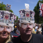 
              Royal fans gather on the Mall near Buckingham Palace, London, Saturday June 4, 2022 ahead of the Platinum Jubilee concert, on the third of four days of celebrations to mark the Platinum Jubilee. The events over a long holiday weekend in the U.K. are meant to celebrate Queen Elizabeth II's 70 years of service. (AP Photo/Frank Augstein)
            