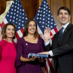 
              FILE - House Speaker Nancy Pelosi of Calif., administers the House oath of office to Rep. Josh Harder, D-Calif., during ceremonial swearing-in on Capitol Hill in Washington, Jan. 3, 2019, during the opening session of the 116th Congress. Representing a district with workers who commute up to 90 miles to jobs near San Francisco, Harder said he plans to emphasize his push to repeal the federal gas tax during his reelection campaign. (AP Photo/Jose Luis Magana, File)
            