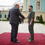 
              In this image provided by the Ukrainian Presidential Press Office, Ukrainian President Volodymyr Zelenskyy, right, and Britain's Prime Minister Boris Johnson, shake hands during their meeting in downtown Kyiv, Ukraine, Friday, June 17, 2022. (Ukrainian Presidential Press Office via AP)
            