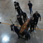 
              Federal police officers arrive with recovered human remains believed to be of the Indigenous expert Bruno Pereira of Brazil and freelance reporter Dom Phillips of Britain, at the Federal Police hangar in Brasília, Brazil, Thursday,, June 16, 2022. A federal police investigator said a suspect confessed to fatally shooting Pereira and Phillips in a remote part of the Amazon and took officers to where the bodies were buried. (AP Photo/Eraldo Peres)
            