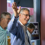 
              South Carolina Rep. Tom Rice greets supporters at Brother's Grill in Myrtle Beach, S.C., as he waits for primary election results to come in, Tuesday, June 14, 2022. (Jason Lee/The Sun News via AP)
            