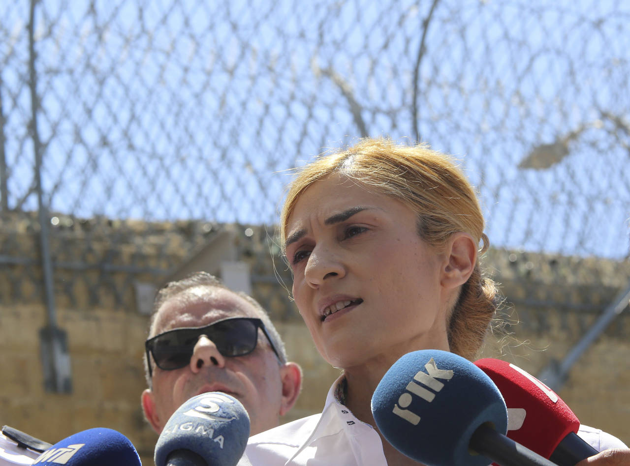 Cyprus Prisons Director Anna Aristotelous speaks to the media after formally filing a complaint aga...