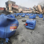 
              Containers of hydrogen peroxide, lie scattered after explosion at the BM Inland Container Depot, where a fire broke out around midnight Saturday in Chittagong, about 210 kilometers (130 miles) southeast of, Dhaka, Bangladesh, Monday, June 6, 2022. Dozens of people were killed and more than 100 others were injured after the inferno broke out following explosions in a container full of chemicals. (AP Photo)
            