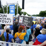 
              People arrive to attend the second March for Our Lives rally in support of gun control in front of the Washington Monument, Saturday, June 11, 2022, in Washington. The rally is a successor to the 2018 march organized by student protestors after the mass shooting at a high school in Parkland, Fla. (AP Photo/Manuel Balce Ceneta)
            