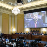 
              An image of former President Donald Trump is displayed as the House select committee investigating the Jan. 6 attack on the U.S. Capitol continues to reveal its findings of a year-long investigation, at the Capitol in Washington, Tuesday, June 21, 2022. On June 23, the Jan. 6 committee will hear from former Justice Department officials who faced down a relentless pressure campaign from Donald Trump over the presidential election results. (Al Drago/Pool Photo via AP)
            