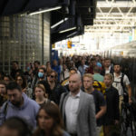 
              Passengers disembark from one of the few trains to arrive this morning at Waterloo railway station in London, Tuesday, June 21, 2022. Britain is facing its biggest rail strikes in decades after last-minute talks between a union and train companies failed to reach a settlement over pay and job security. Up to 40,000 cleaners, signalers, maintenance workers and station staff are due to walk out for three days this week, on Tuesday, Thursday and Saturday. The strike is expected to shut down most of the rail network across the country, with London Underground subway services also hit by a walkout on Tuesday. (AP Photo/Matt Dunham)
            