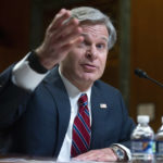 
              FILE - FBI director Christopher Wray testifies during a Senate Appropriations Subcommittee hearing in Washington, on May 25, 2022. Wray says his agents thwarted a planned cyberattack on a Boston children's hospital that was to have been carried out by hackers sponsored by the Iranian government. (Bonnie Cash/Pool Photo via AP, File)
            